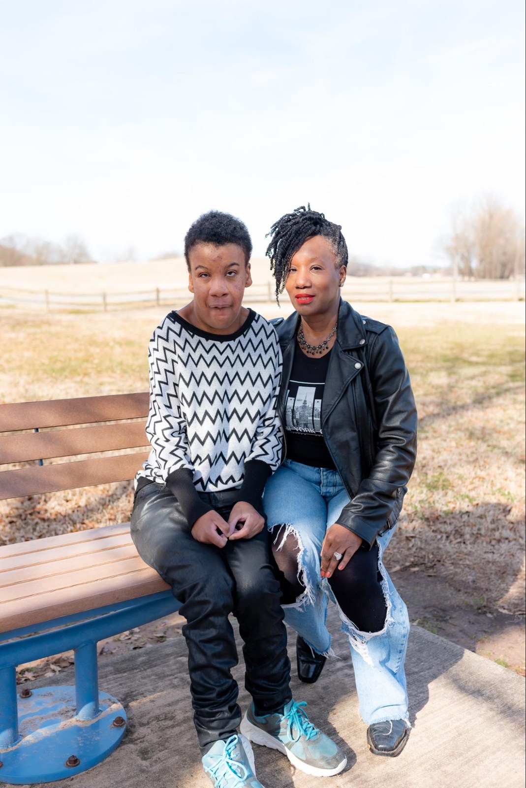 Tina and Miss T on a bench
